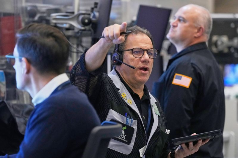 Stock market sinks as AI and interest rate worries grip investors